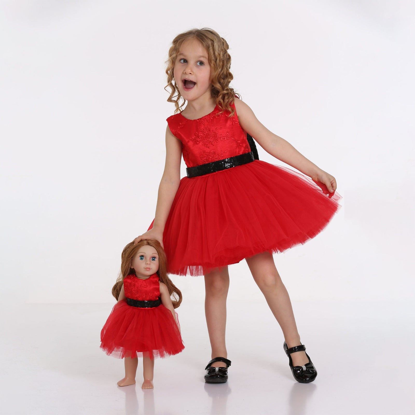 Girl Standing next to Mais, the Little me Doll, made by LaftaKids, both wearing Red Dress facing forward